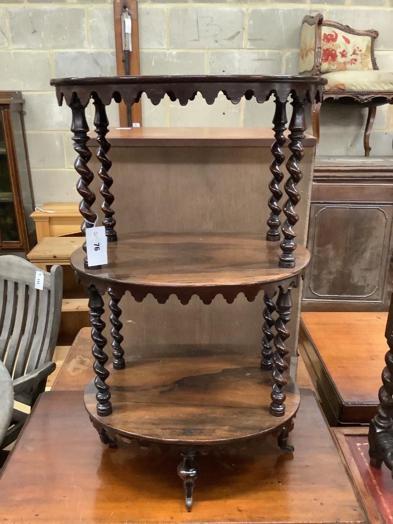 A Victorian rosewood oval three tier whatnot, width 48cm, depth 34cm, height 81cm